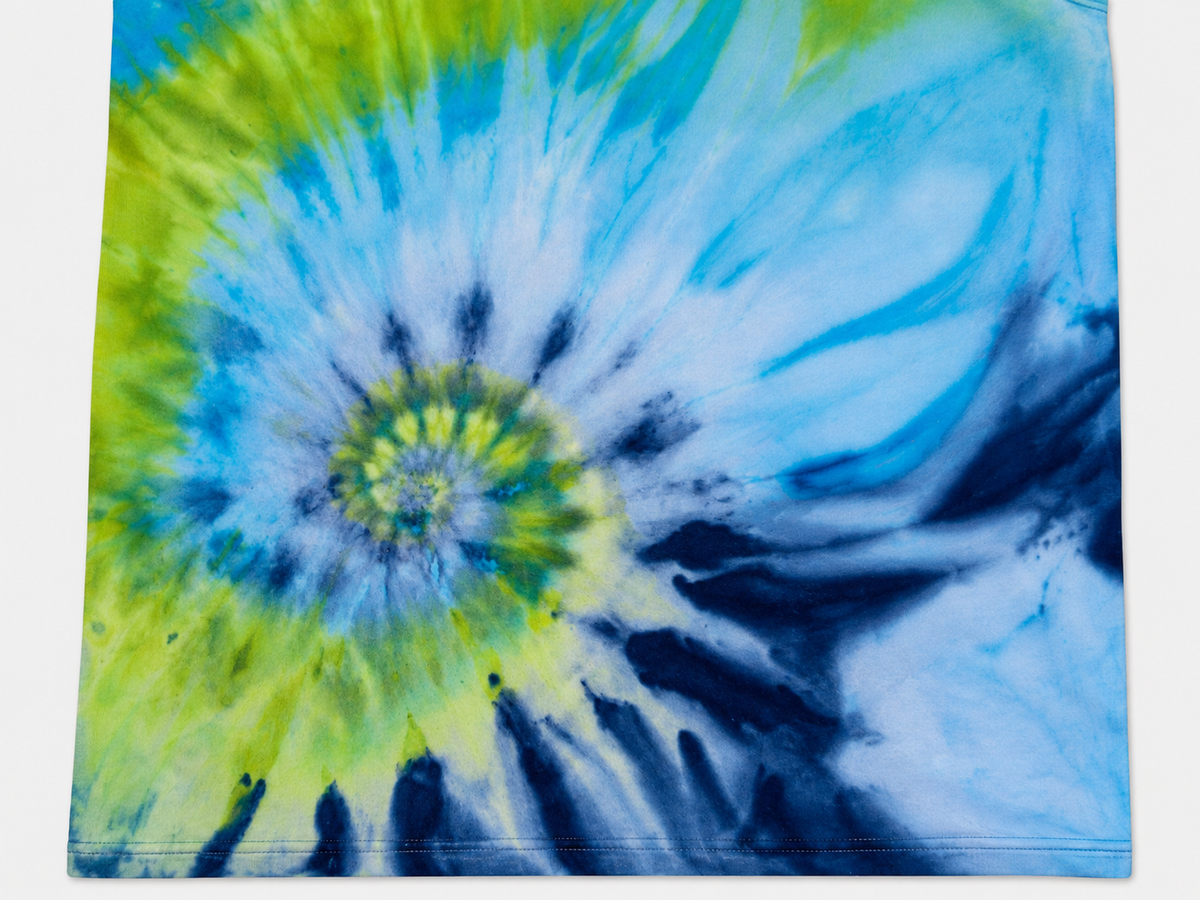 Close-up of Lagoon Bloom's small green-centred blue and white spiral
