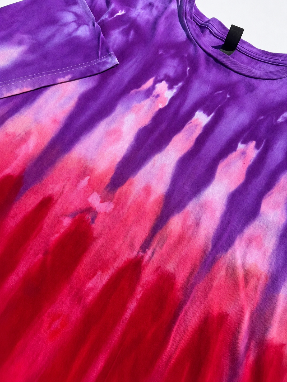 Violet Inferno neckline and purple-pink dye detail
