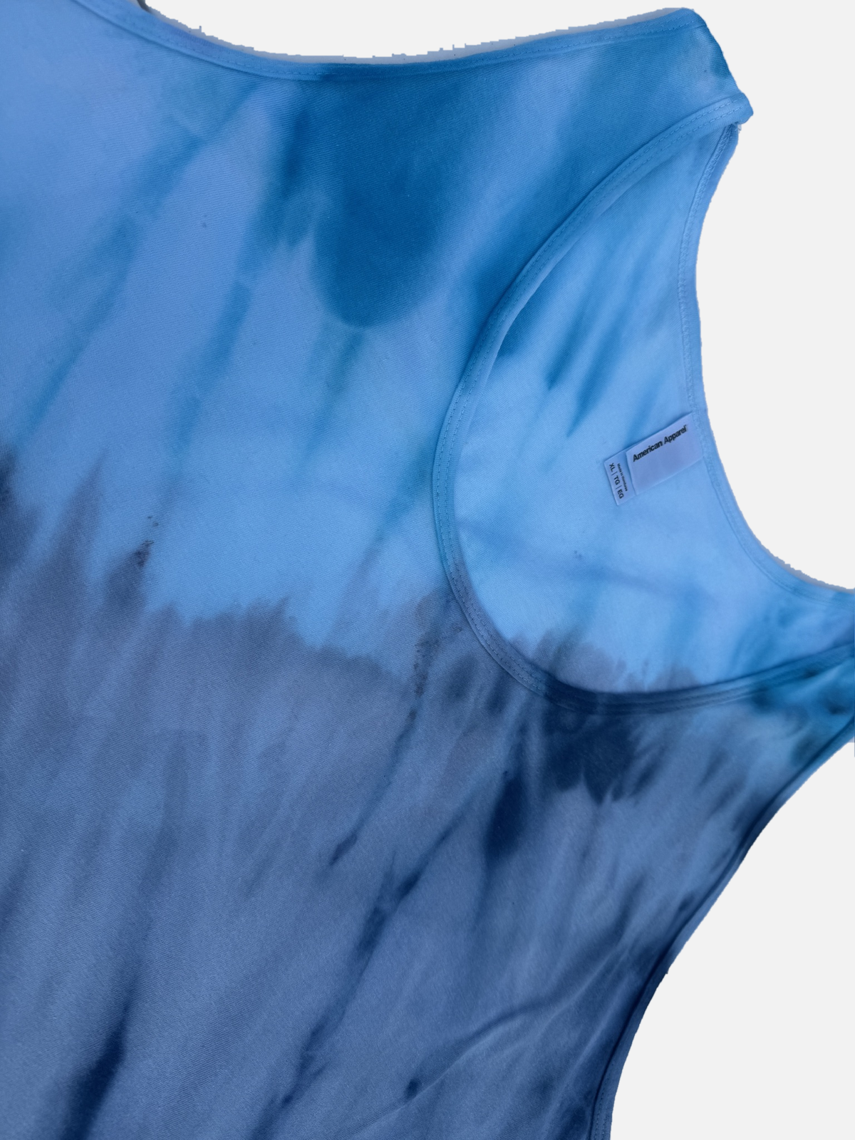 Deep Current neckline and armhole detail in blue